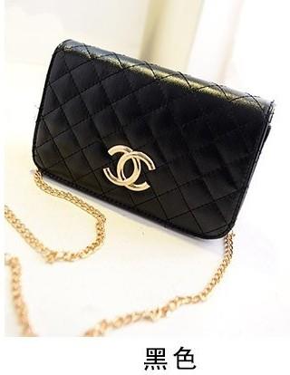 black and gold sling bag