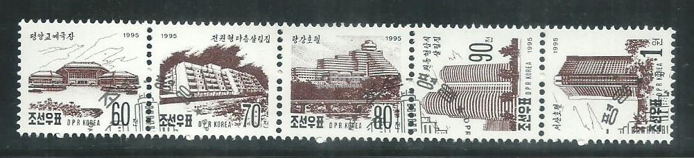 NK-19951215	NORTH KOREA 1995 BUILDINGS ON KWANGBOK STREET PYONGYANG