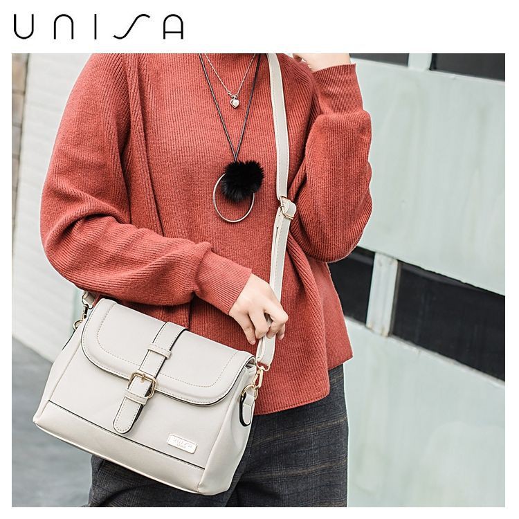 UNISA Faux Leather Sling Bag With Flap Over Closure